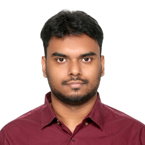 ShafinBinHamid Profile image of Vivian Rogers, sitting on grass in front of a lake/fountain, full body.